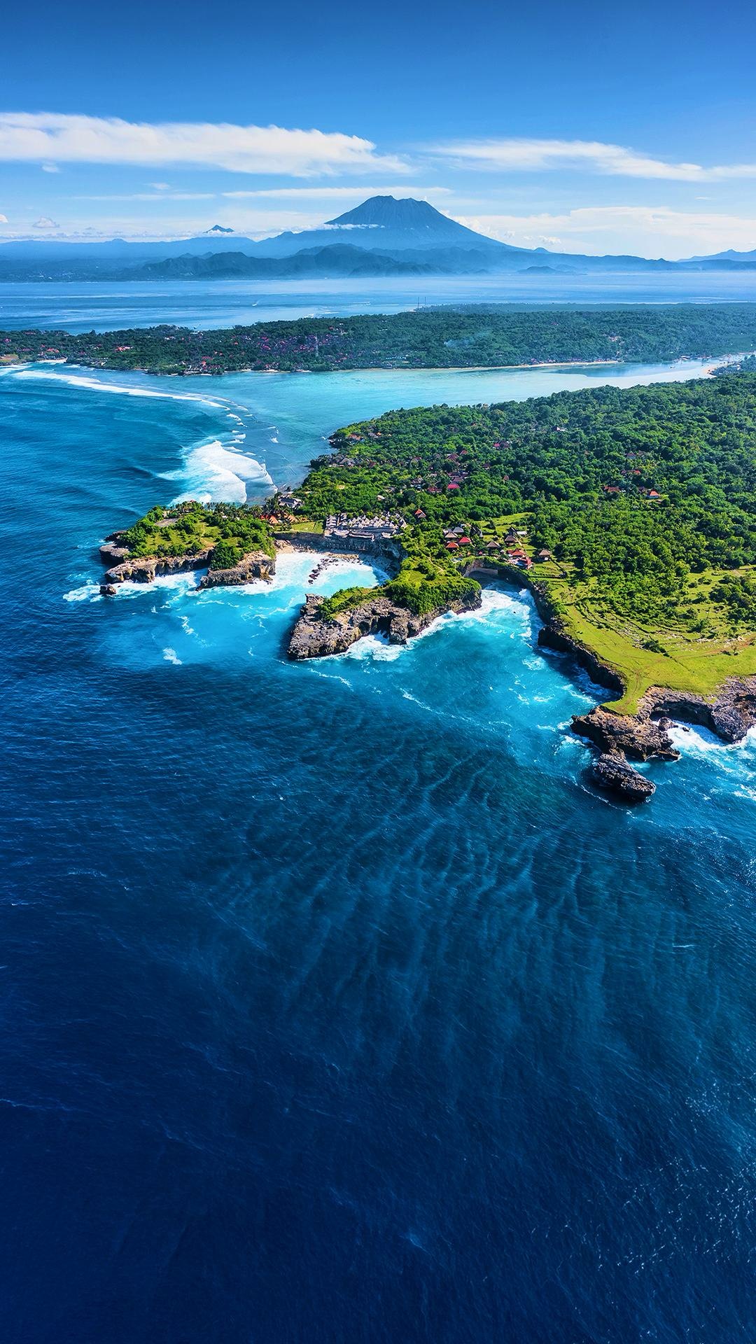 Island coastline and reef flats seen from altitude