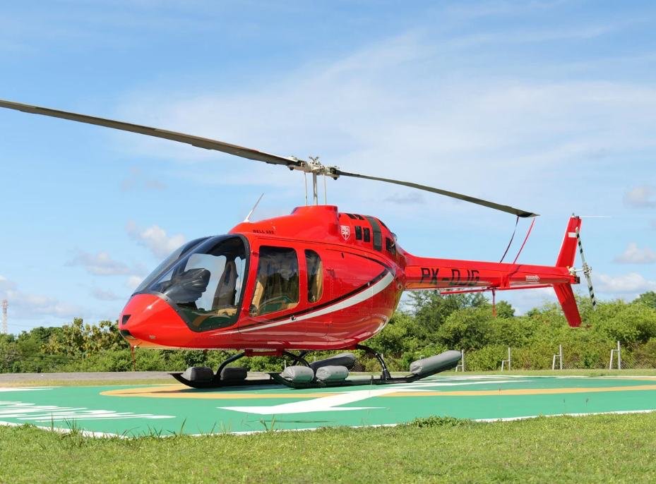 Single-engine turbine helicopter on the landing pad