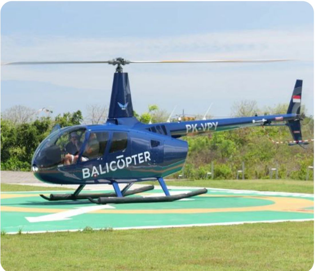 Turbine helicopter waiting on the marked pad at the Nuanu heliport