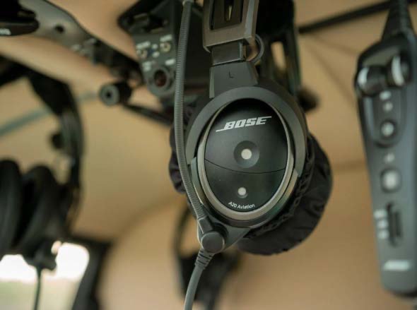 Noise-cancelling aviation headset in the cabin