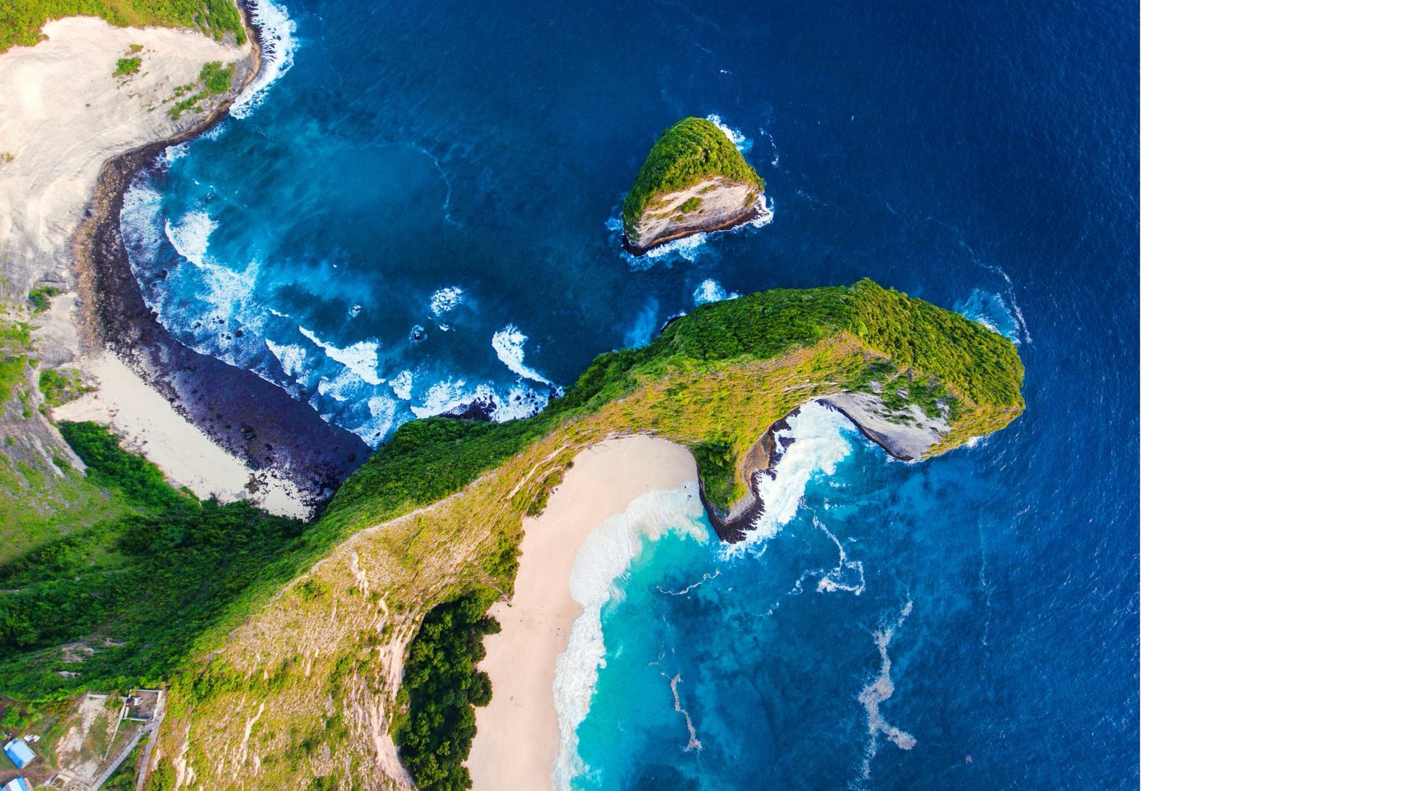 Headland and beach on the Penida cliff coast from the air